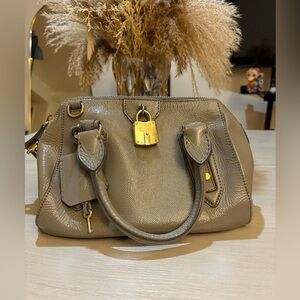 Burberry Gray Crossbody Bag and hand bag with lock and key.